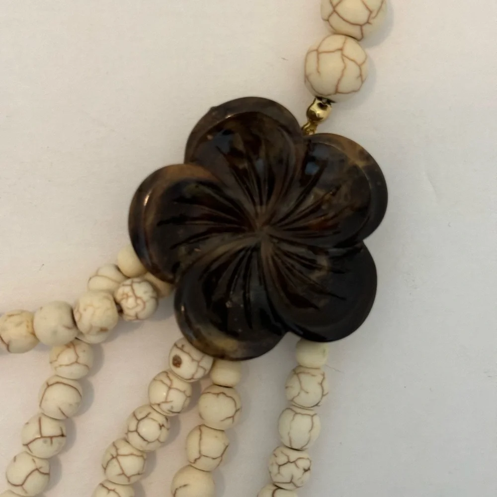 Gorgeous earth tone beaded necklace with brown floral accents